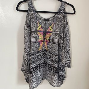 Jessica Simpson sheer cold shoulder top.